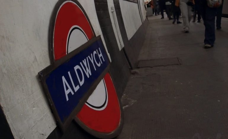 Vintage Aldwych station sign inside the disused Underground station, showcasing the historic and iconic design of the London Tube.