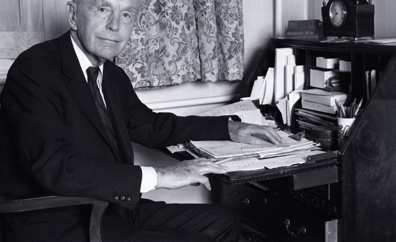 Alec Douglas-Home sitting at a desk, associated with British elections