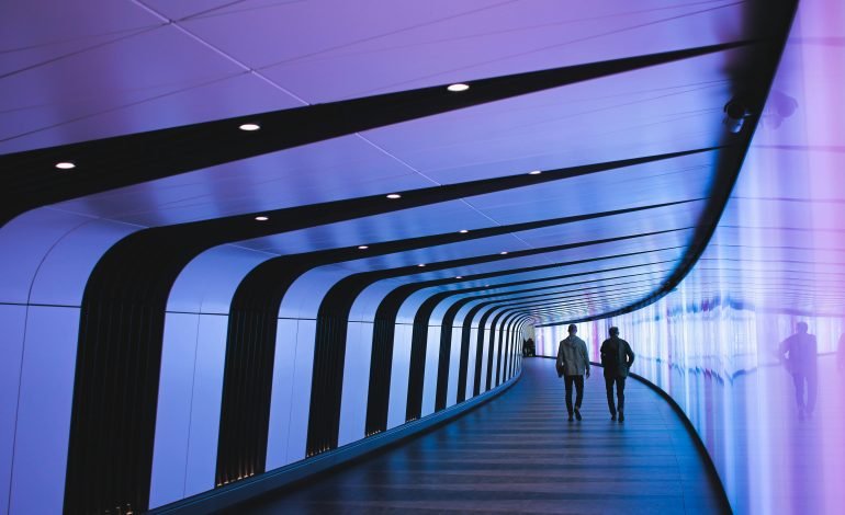 London businesses in a modern corridor with digital lighting
