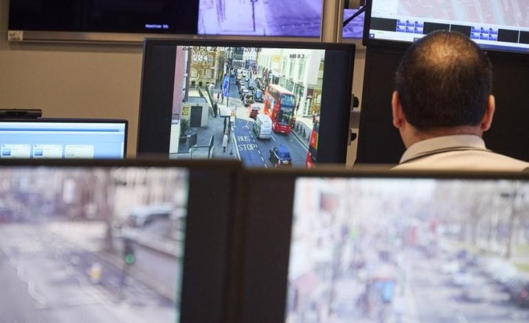 Local CCTV Control Room in Hammersmith Town Centre, showing screens and operators viewing various parts of the borough. Council leaders have assured the public that new AI-assisted features will not include intrusive Facial Recognition technology.