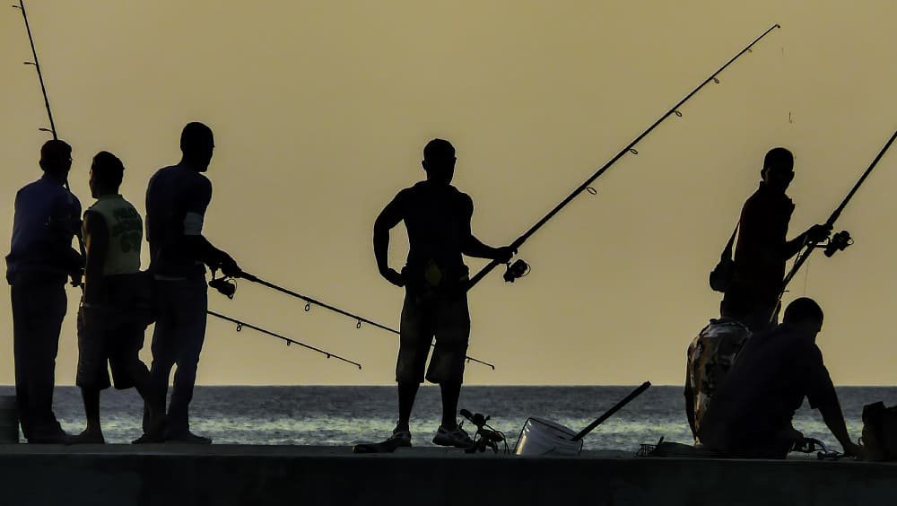 Fishermen at Sunset in Havana, Cuba.