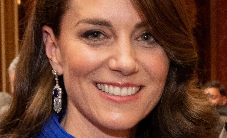 Princess of Wales smiling at a public event, highlighting her grace and royal presence.