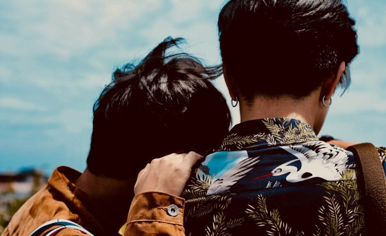 Thailand marriage equality celebration with a couple embracing, symbolising love and inclusivity.