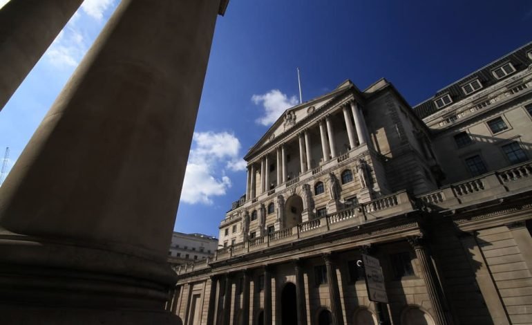 Bank of England building in London under a clear blue sky, symbolising financial stability and interest rate decisions.