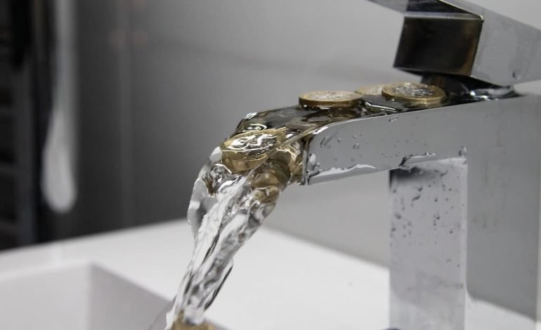 Coins flowing from a water tap symbolising the rise in UK water bills.