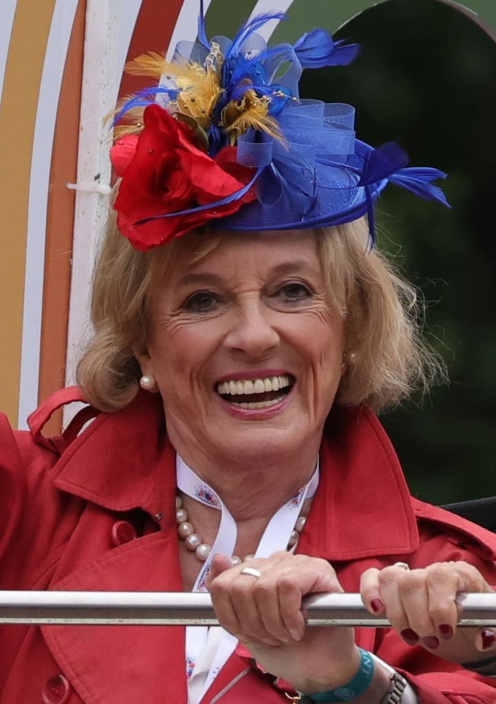 Esther Rantzen smiling and wearing a colourful hat, advocating for the assisted dying bill in Britain