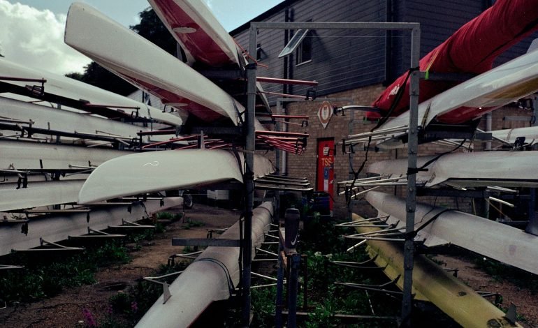 Rowing boats at Fulham Reach Boat Club, showcasing the club's upcoming Festive Fun River Run