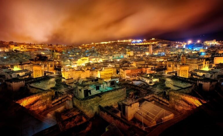 Stunning view of Fes at night, one of the cheapest flight destinations from London in 2025.