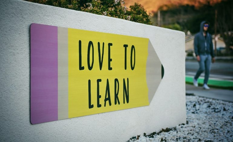 special schools sign says love to learn