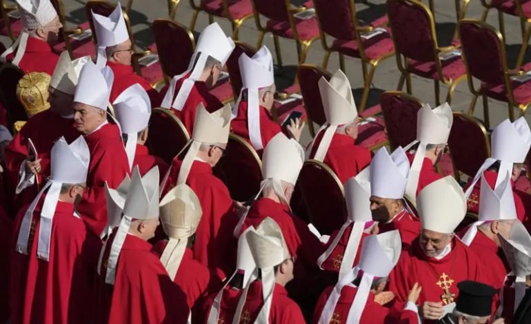 Cardinals in red robes gather for ceremony during Pope Francis funeral details