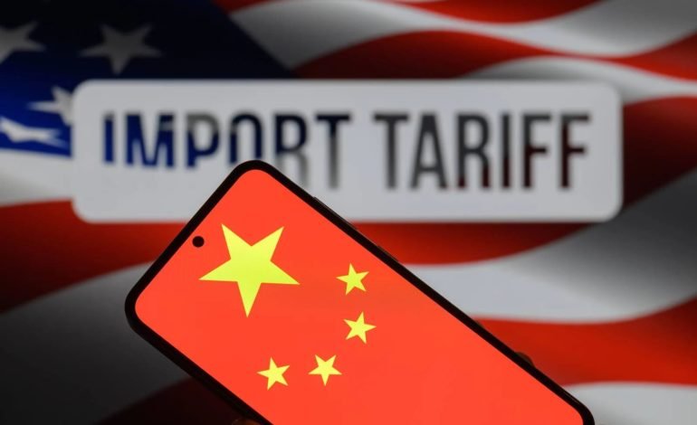 China response to Trump tariffs shown through Chinese flag on phone with US import tariff background