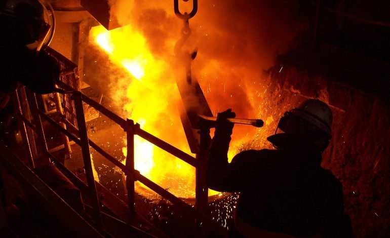 Molten metal pouring at British Steel's Scunthorpe plant during furnace operation