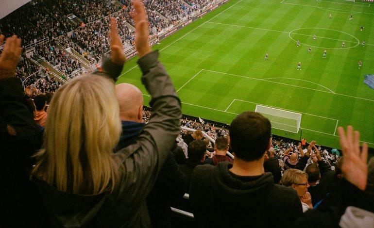 Premier League football fans in the stands
