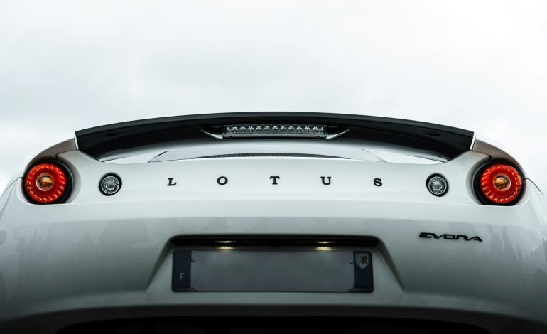 looking up picture of a white lotus evora from behind