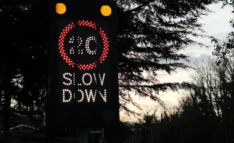 20mph speed limit sign saying slow down
