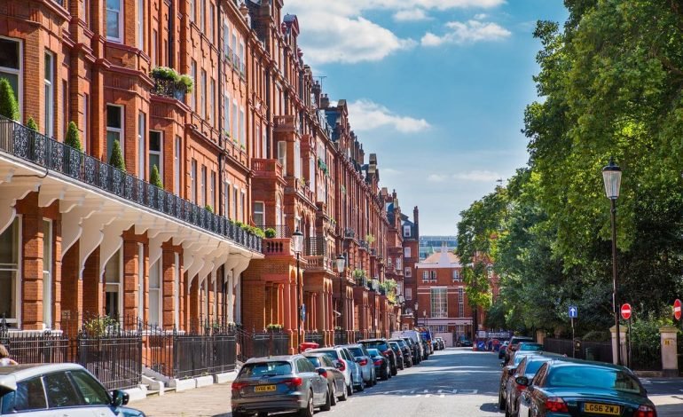 London residential street lined with red brick terraces reflecting UK rental market trends 2025