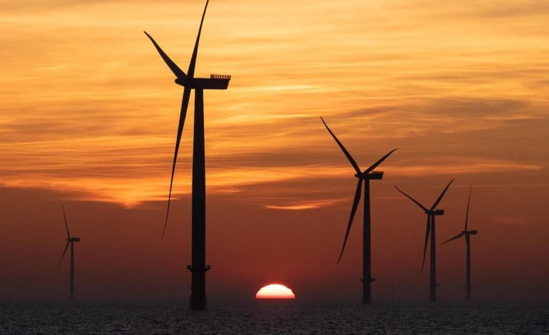 Wind energy surpasses gas in EU with offshore turbines at sunset