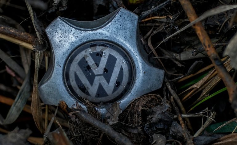 discarded vw hubcap for dieselgate article