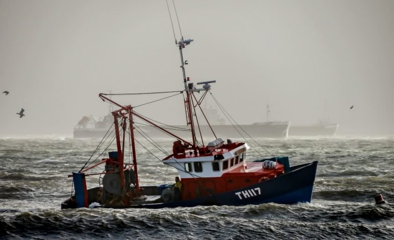 trawler boat in rough seas during a storms