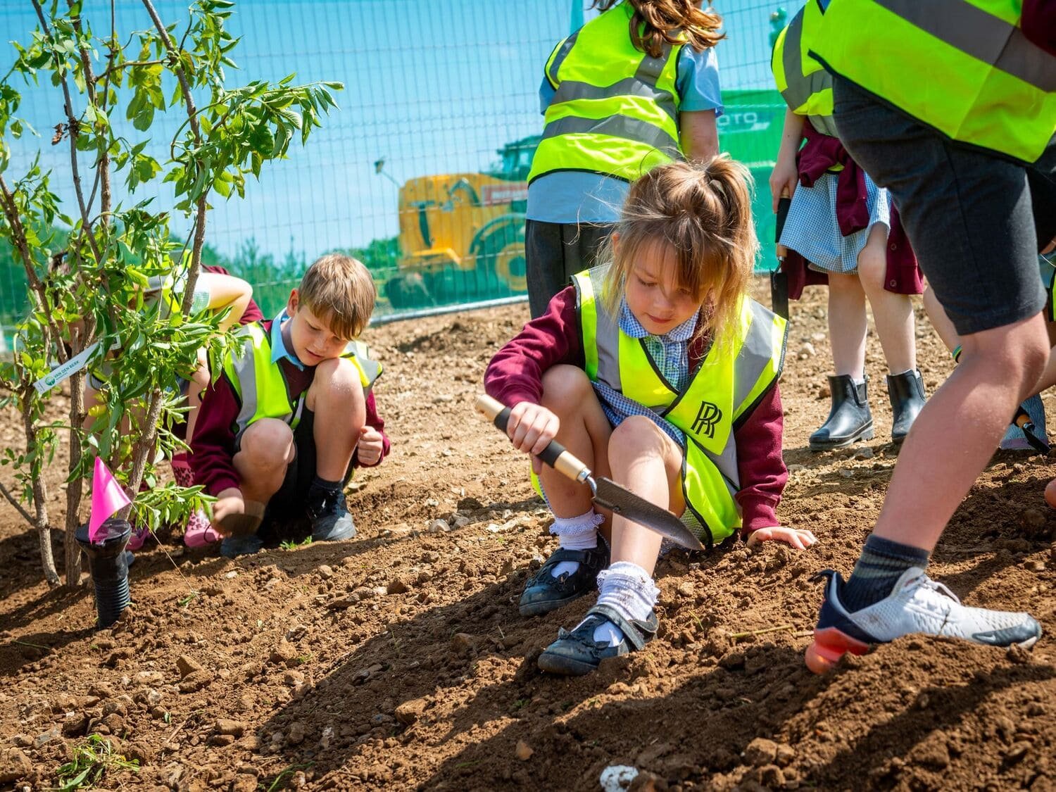 Year 2 pupils plant first new tree at Rolls-Royce home