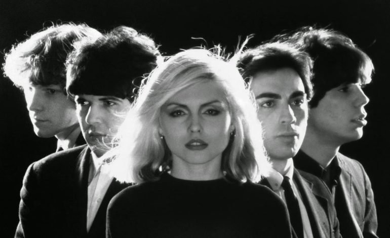 Black and white portrait of Blondie band members in 1978 with Debbie Harry at the centre.