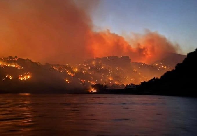 Crete wildfire forces mass evacuation as flames damage homes near coastline