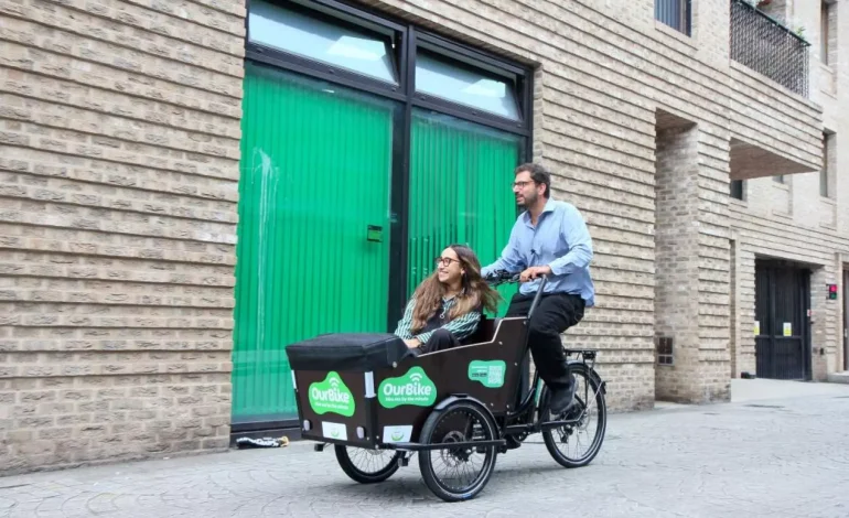 people on an e cargo bike