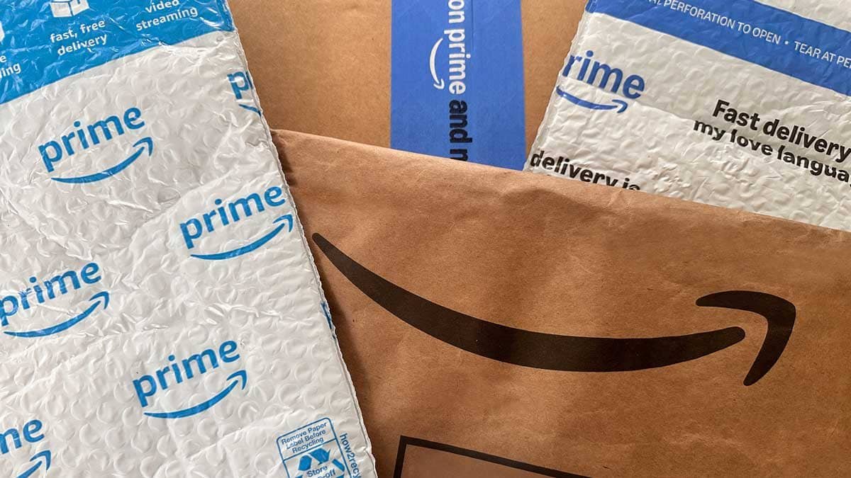 Amazon Prime settlement — packaging with Prime branding highlighting delivery and subscription services