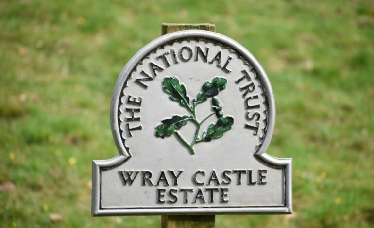 sign that says the national trust wray castle estate