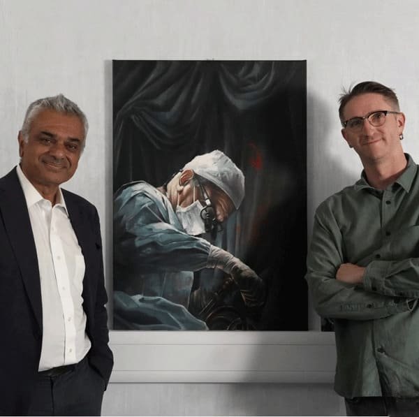 2 Thomas D Wright with Dr Giampaolo Martinelli beside a surgical painting from his ‘A Corporeal God’ series