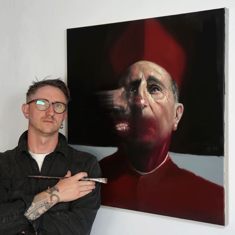7 Thomas D Wright in his studio beside a cardinal portrait with motion blur from the ‘A Corporeal God’ series