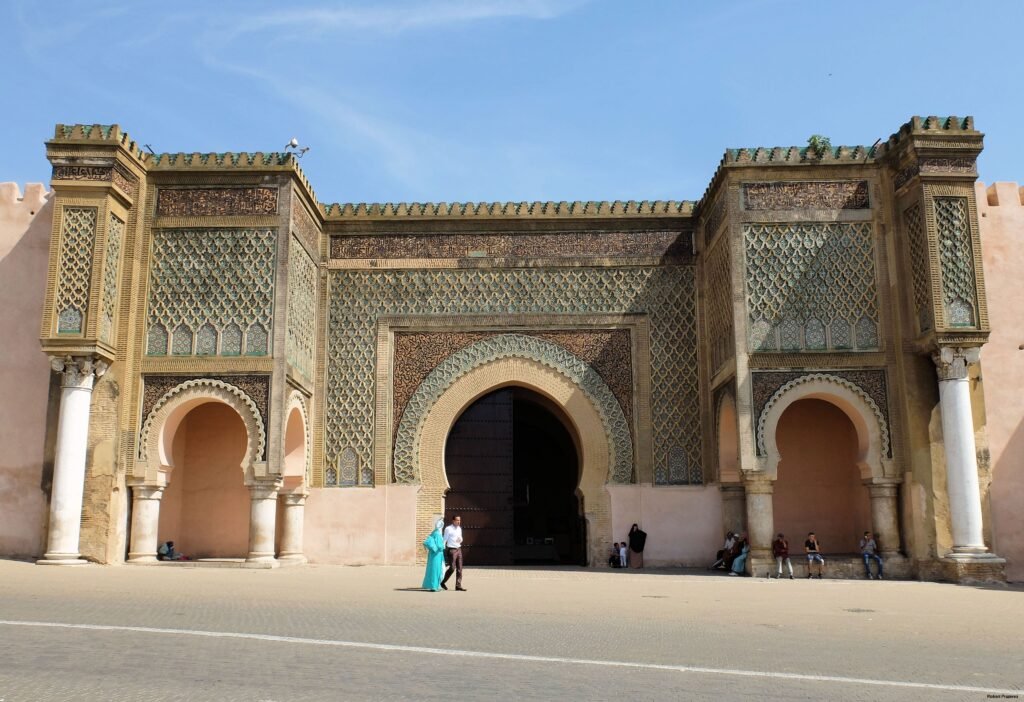 Bab al Mansour in Meknes — a monumental 18th century gate famed for its intricate zellij tilework and grand arches, symbolising the city’s imperial heritage.