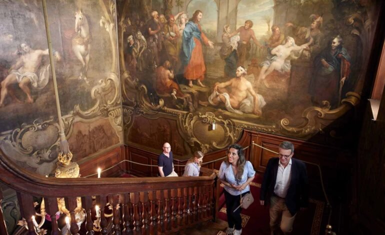 Hogarth murals St Bartholomew’s Hospital on the Hogarth Stair with visitors in the restored North Wing