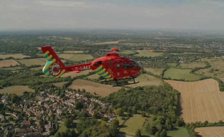 London’s Air Ambulance Airbus H135 helicopter flying over the city on anniversary year.jpg