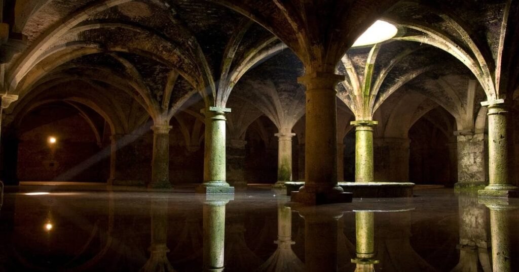 The hauntingly beautiful Portuguese Cistern beneath El Jadida — a Gothic style underground chamber where filtered light reflects across still waters, preserving centuries of colonial history.