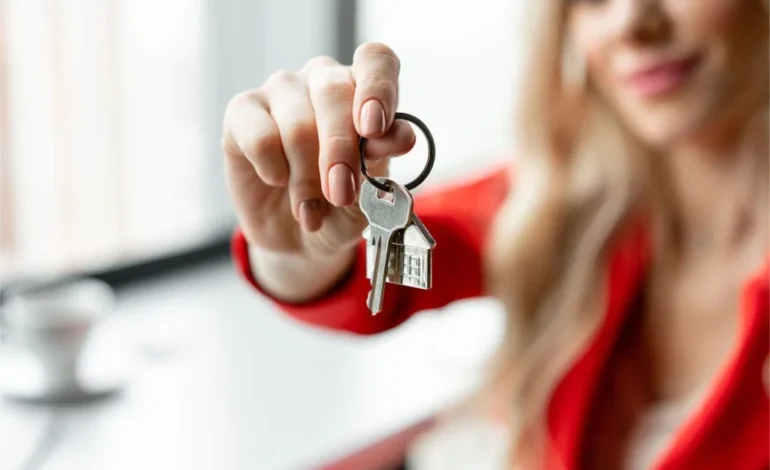 Woman holding house keys symbolising new tenancy rights under the Renters Rights Bill.