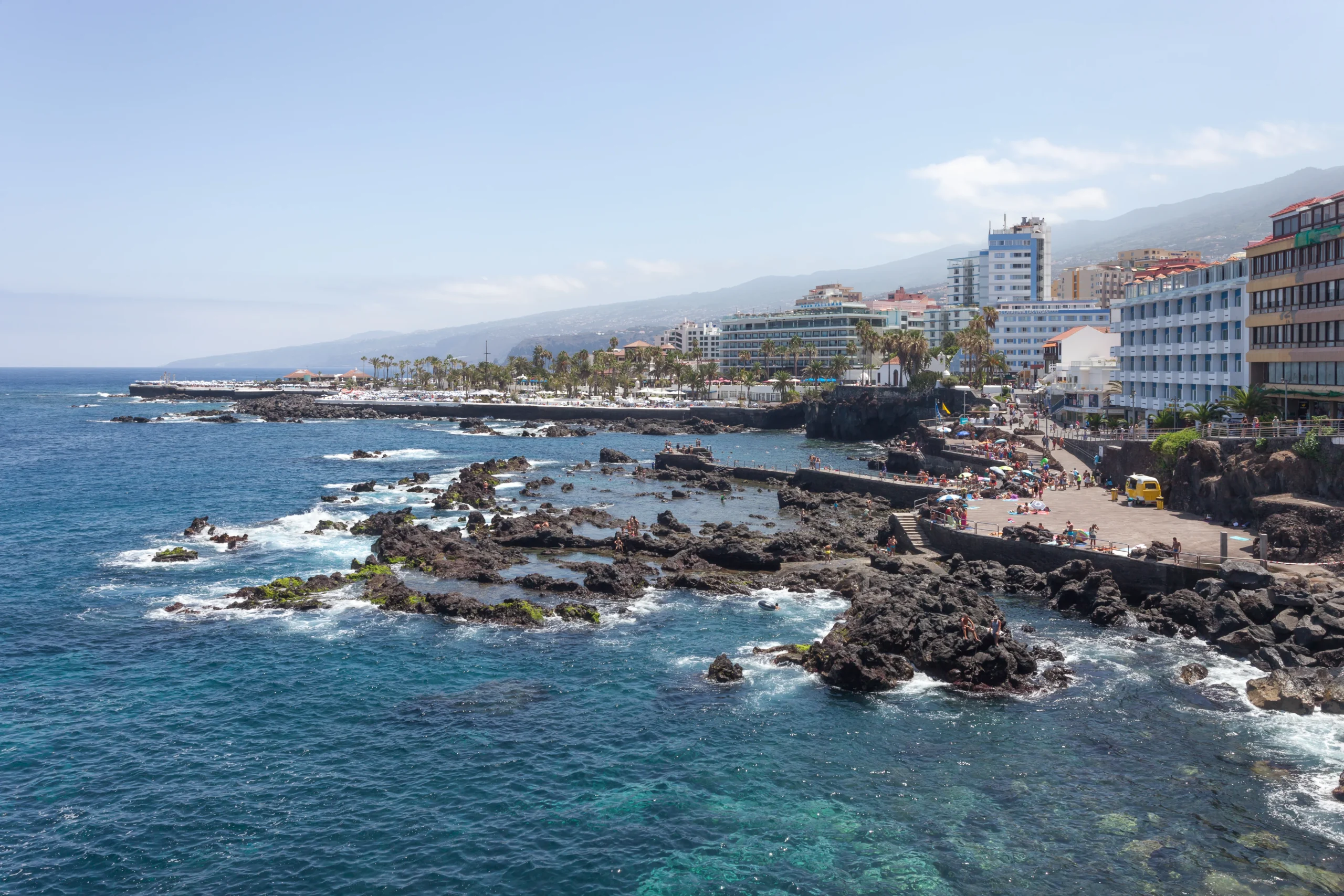 Tenerife’s calm broken by towering waves.
