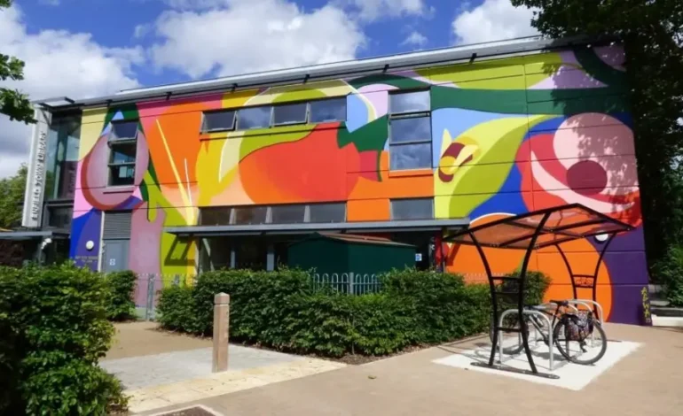Conservation area mural in Enfield Town on the side of the library building
