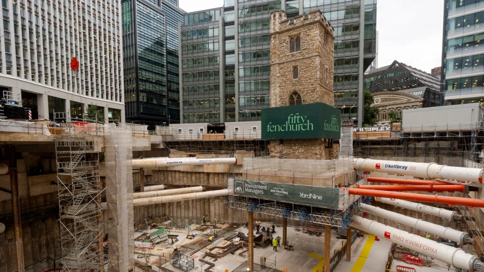 Medieval church tower suspended in mid-air over London building site
