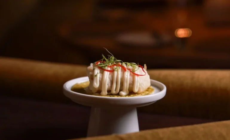Poached trout from the main menu at 74 Charlotte Street, offered alongside the tasting menu.