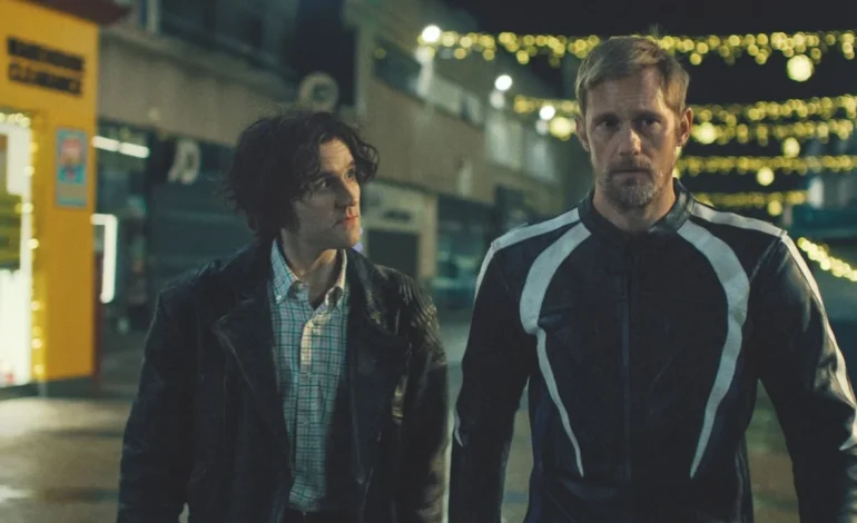 Scene from Pillion showing Harry Melling and Alexander Skarsgård in a tense moment from the film, reviewed in EyeOnLondon’s Pillion film review