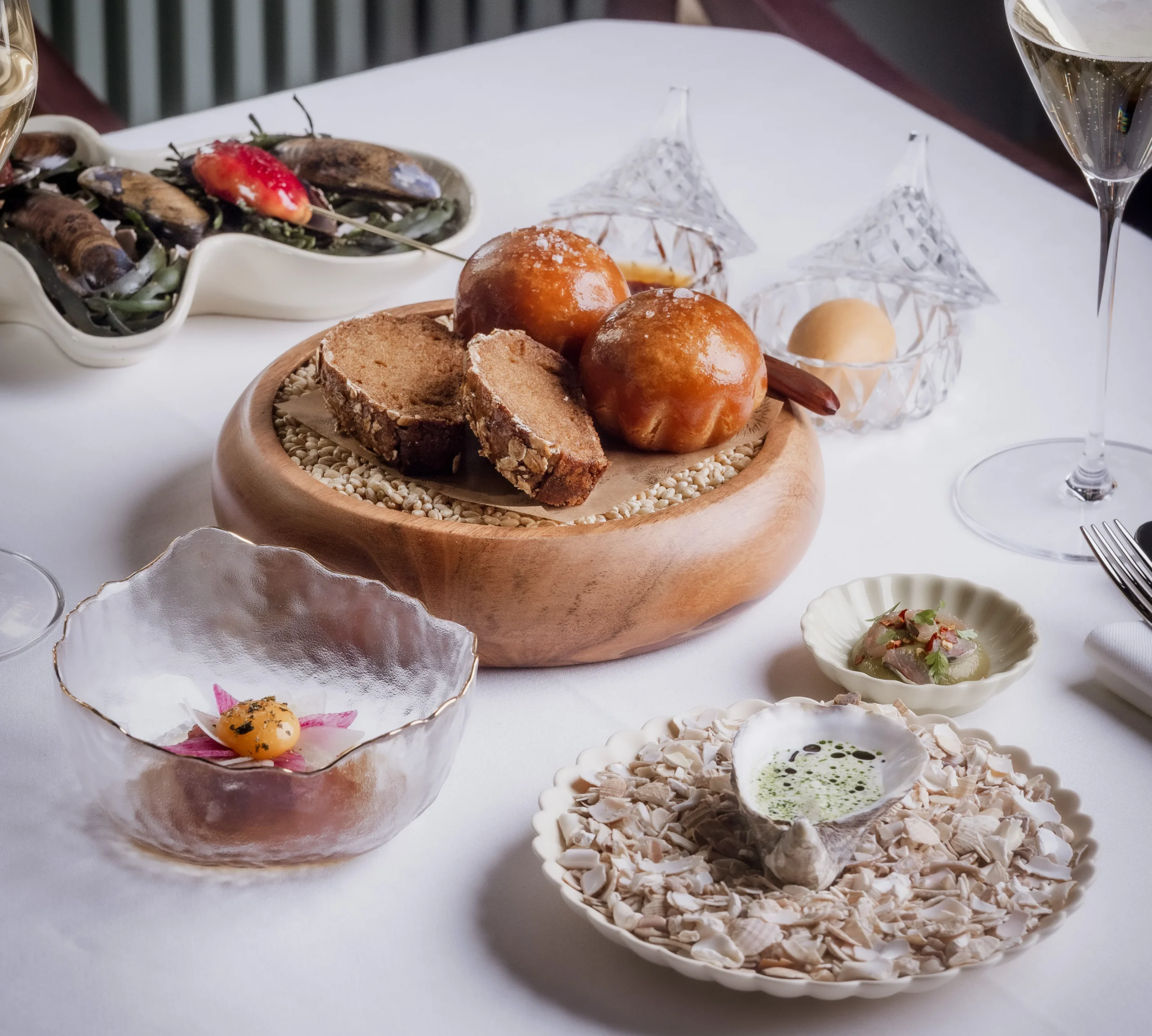 Seafood small plates and bread course at Tom Brown at The Capital.