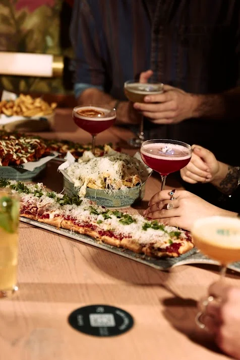 Brunch plates to share, cocktails on the table, and no reason to rush.