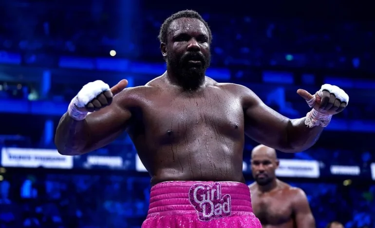 Chisora’s 50th fight as Derek Chisora celebrates victory in the ring ahead of his London bout