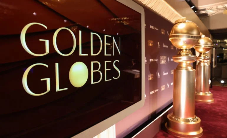 Golden Globes 2026 awards signage and statuettes on display at the Beverly Hilton in Los Angeles