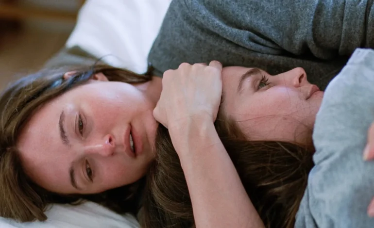 Sentimental Value review still showing Renate Reinsve and Inga Ibsdotter Lilleaas in an intimate family moment