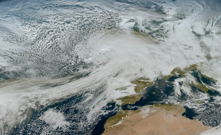Storm Chandra weather system moving across the UK and western Europe, bringing heavy rain and snow