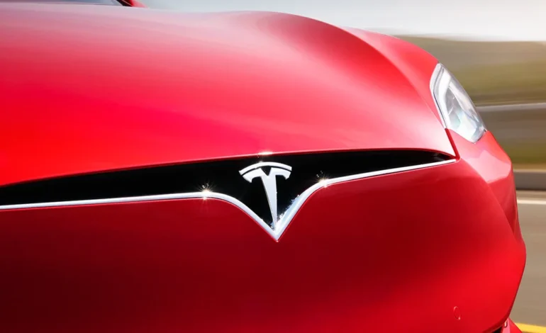 Tesla Full Self Driving subscription change shown on Tesla vehicle badge