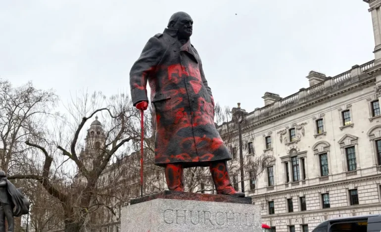 Churchill statue Parliament Square defaced with graffiti and cordoned by police