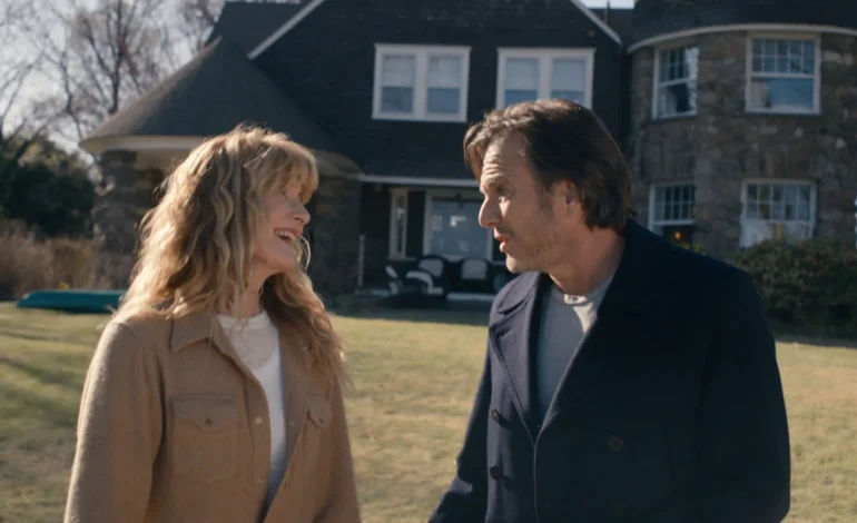Is This Thing On film review showing Will Arnett and Laura Dern as Alex and Tess Novak outside the family home in Bradley Cooper’s comedy drama